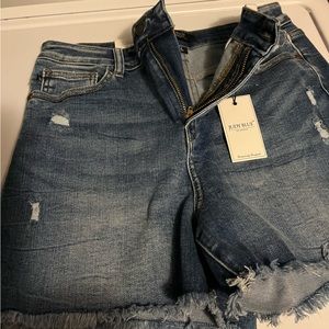 Judy, blue medium wash cut off jeans shorts. Fits size 8 to 10.